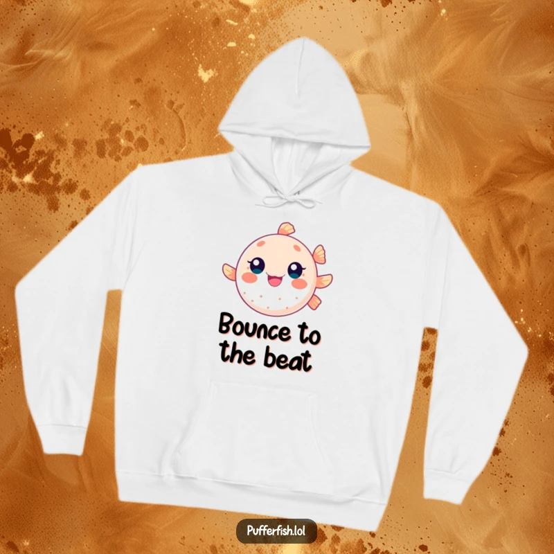 Funny hoodie featuring a round pufferfish character happily bouncing like a ball, offering warmth and a spirit of playful energy.