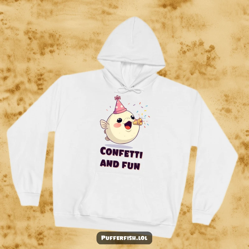 Funny hoodie designed with a cheerful pufferfish sporting a party hat and bursting confetti from a popper, offering warmth and festivity.
