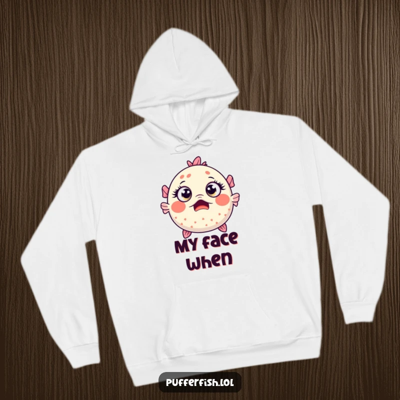 Funny Kawaii pufferfish with wide, surprised eyes, featured on a comfortable and warm hoodie.