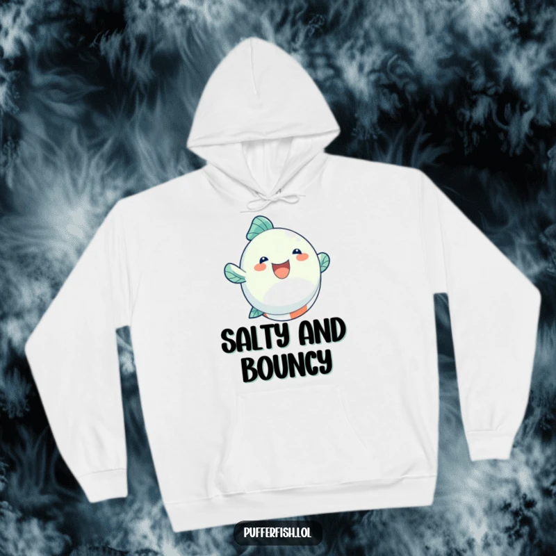 Funny Hoodie featuring a round, inflated fish character joyfully bouncing on a colorful beach ball, perfect for warm, casual wear.