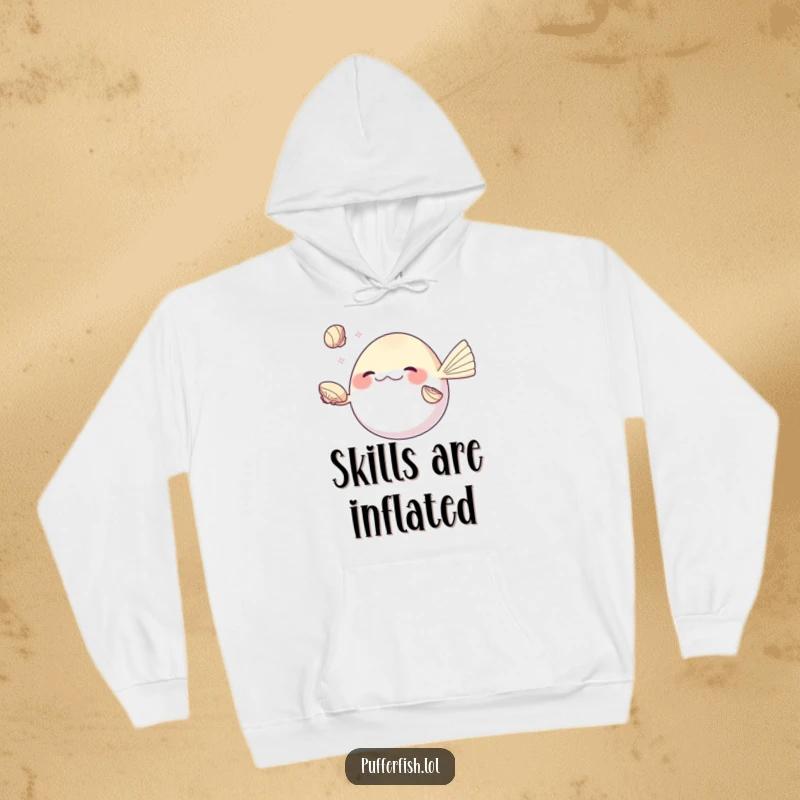 Funny pufferfish hoodie, skillfully juggling shiny seashells with its fins, a cozy and humorous design for fans of talent.