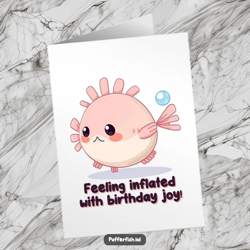 Funny Free Printable Birthday Card: Playful pufferfish in blue sea chasing a sparkling bubble, making a splashy greeting.