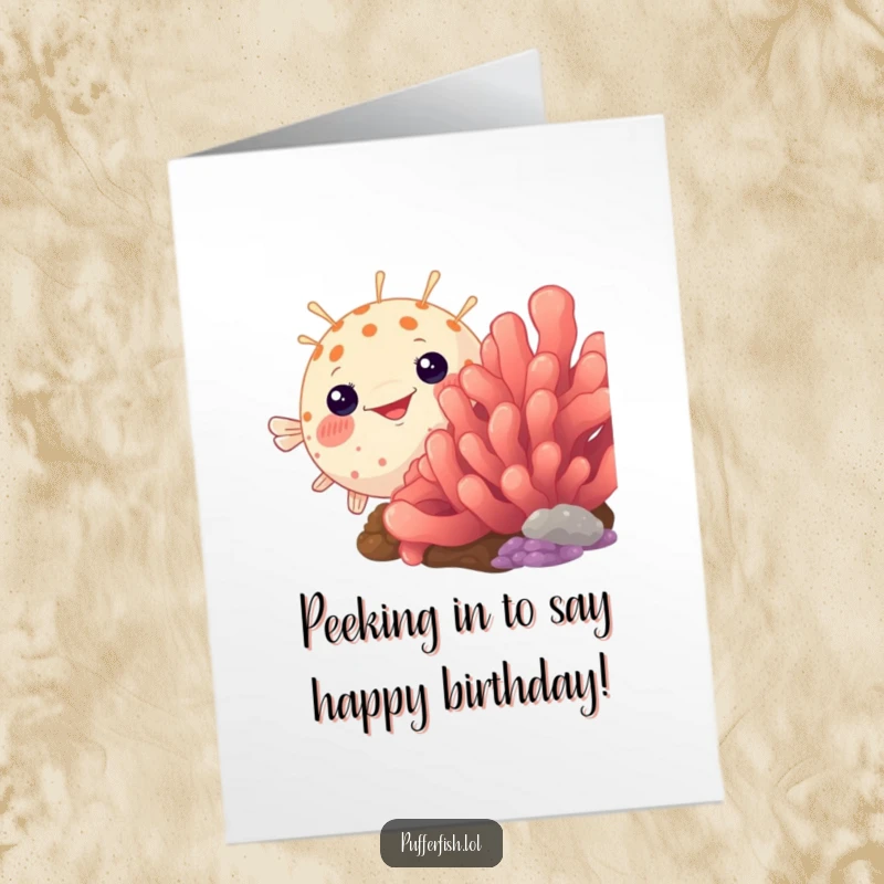 Funny Free Printable Birthday Card with a pufferfish humorously peeking from behind vibrant coral, a delightful DIY gift surprise.