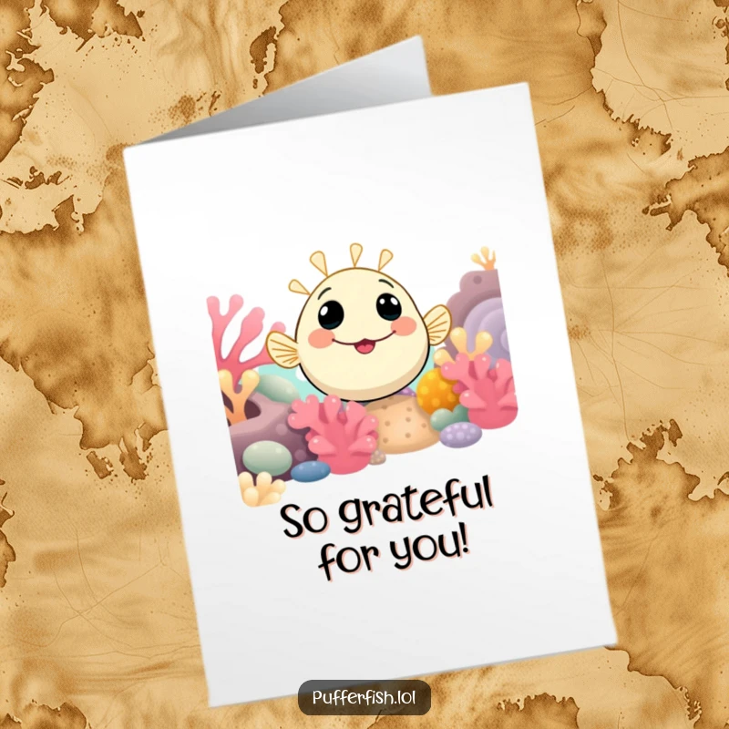 Funny Free Printable Thank You Card: A curious pufferfish with a friendly smile emerges from a detailed coral reef.