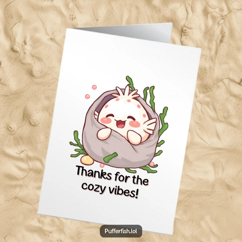 Funny Free Printable Thank You Card: Adorable kawaii pufferfish giggling contentedly while wrapped in its cozy seaweed blanket, perfect for saying thanks.