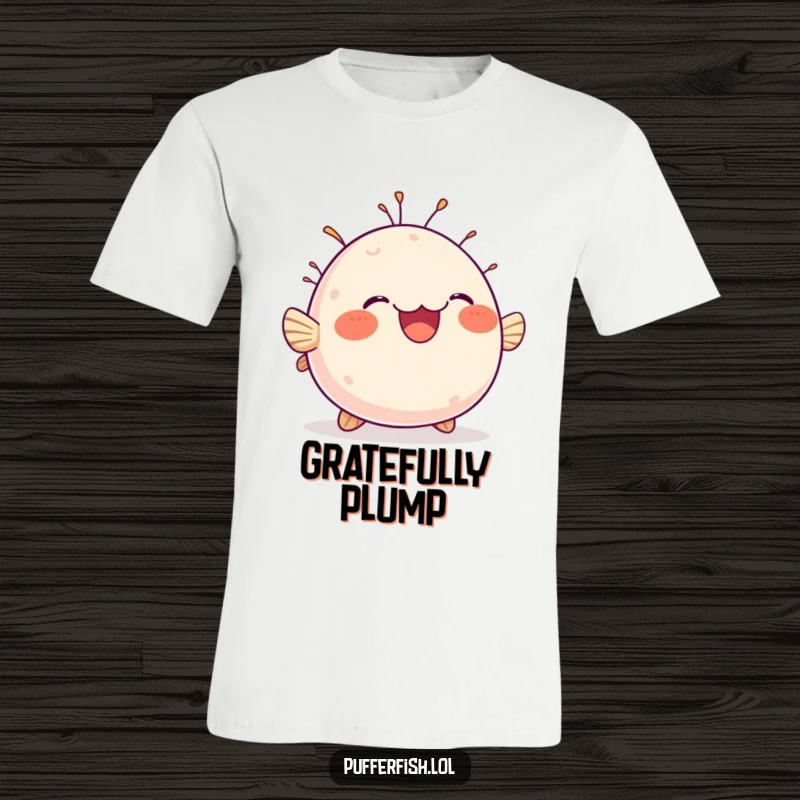 Funny t-shirt featuring a chubby, round pufferfish joyfully bobbing up and down with an expression of pure, unadulterated delight.