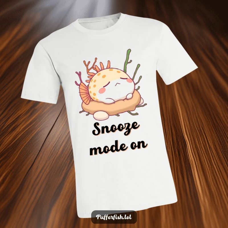 Funny Pufferfish T-Shirt: A peaceful pufferfish snoozes soundly on a bed of soft seaweed, radiating serene humor.