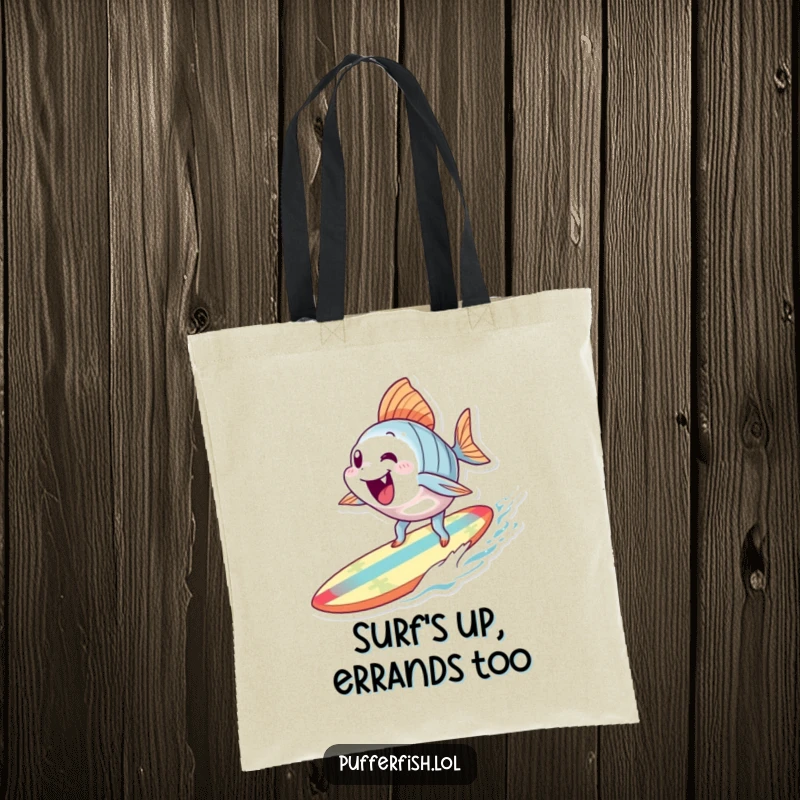 Funny Surfing Fish Tote Bag: A reusable tote bag showcasing an excited fish character surfing on a small, colorful surfboard, ideal for beach trips.